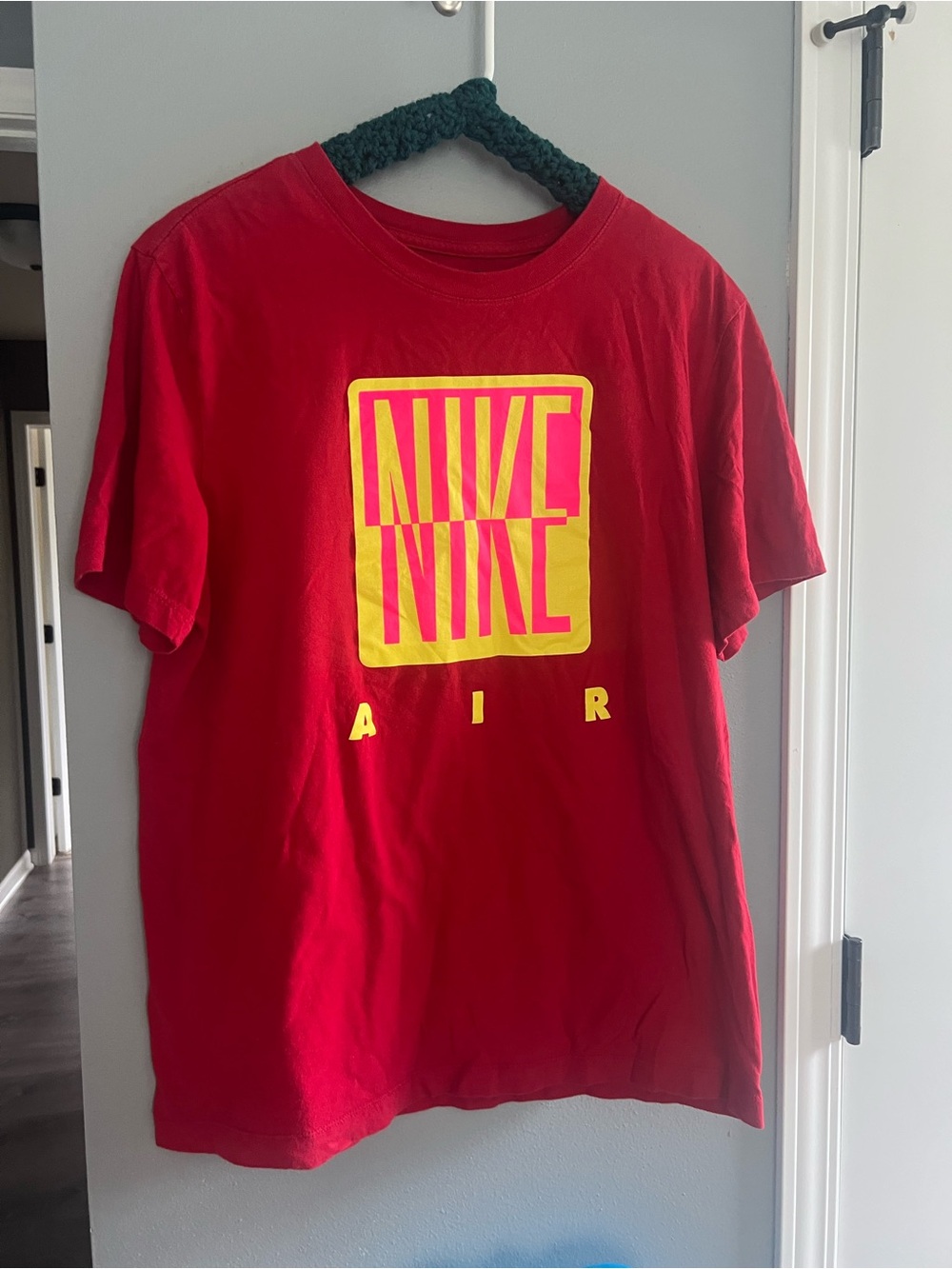 Nike Red Tee with Multicolor Logo